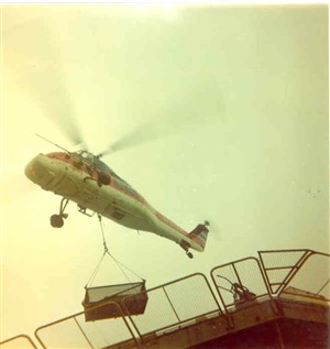Photo:Helcopter working at a platform