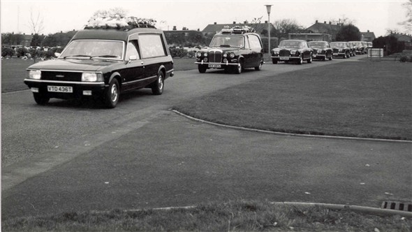 Photo:Hearses carrying out a funeral, 1981