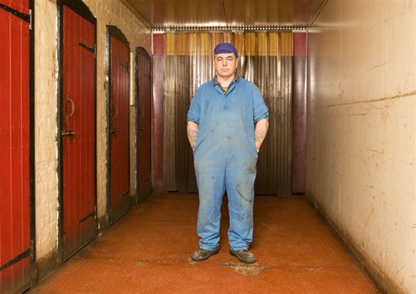Photo:Mike Kelly standing in the corridor which opens on the smoking sheds