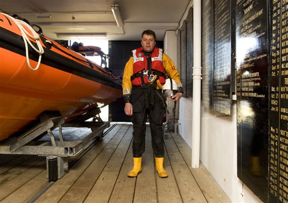 Photo:Portrait of S. Bartram, Coxswain of the Gorleston lifeboat crew, in the lifeboat shed