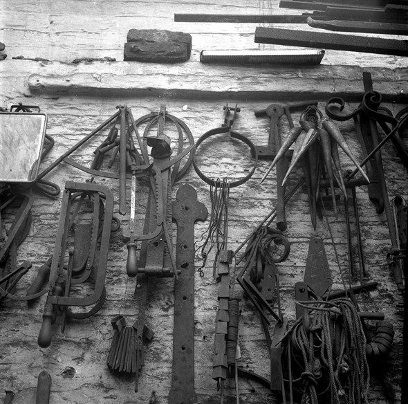 Photo:Photograph of tools hanging on the wall of Fred Leak's Smithy in 1963