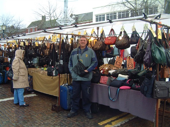 Photo:Alan Pitt, Market Trader, at his stall