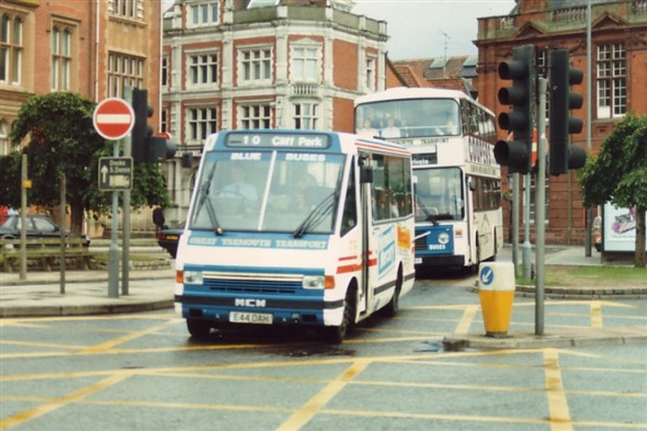 Photo:No ? (E44 OAH) Minibus on Hall Quay with town hall in background
